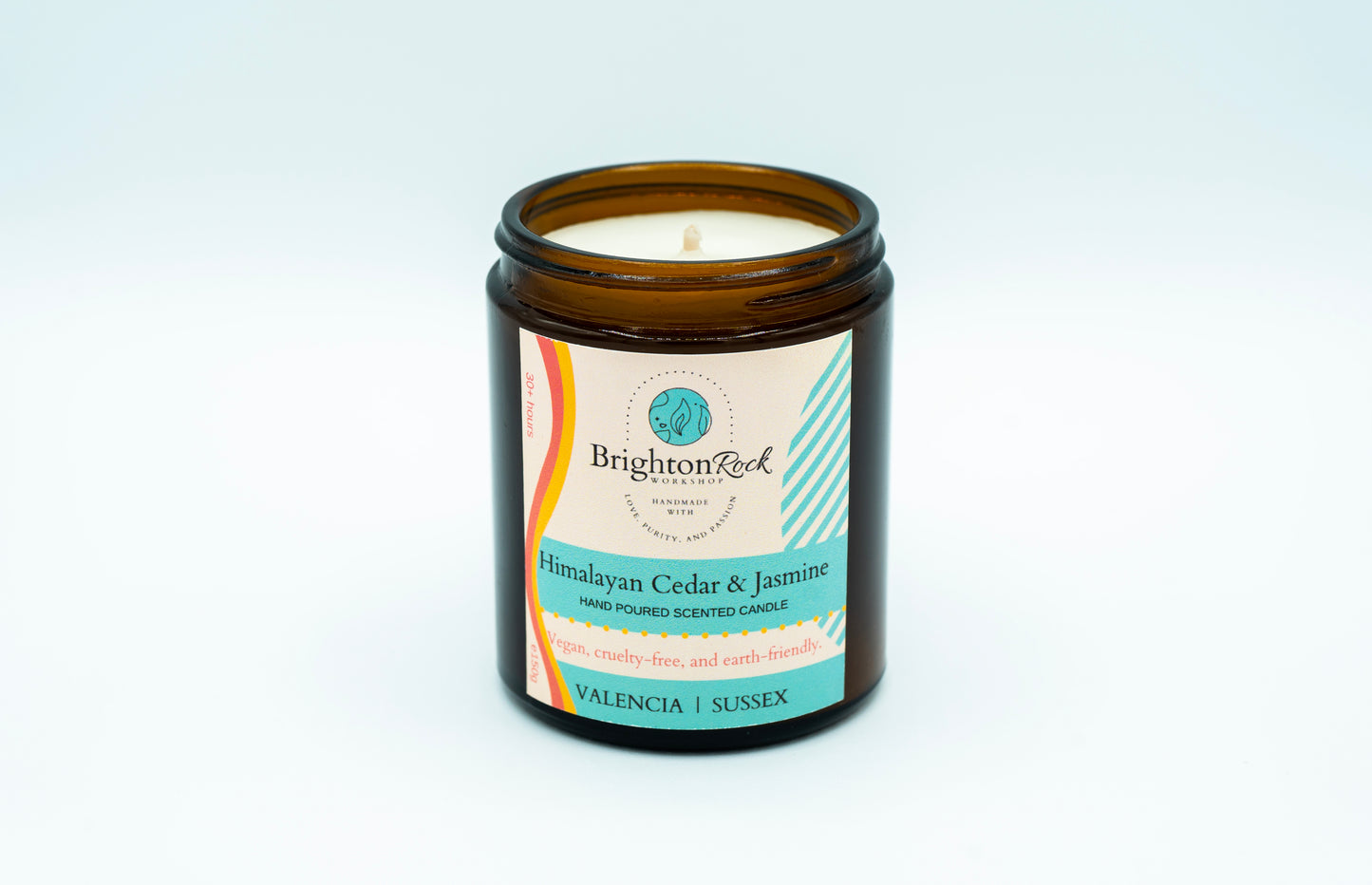 Brighton Rock Workshop Himalayan Cedar & Jasmine scented candle in amber glass jar with black lid. 150g hand poured and handcrafted with love, purity, and passion in Alicante, Spain. Eco-friendly and recyclable, vegan friendly and cruelty free. You are donating to Fripps Farm animal rescue with every purchase.