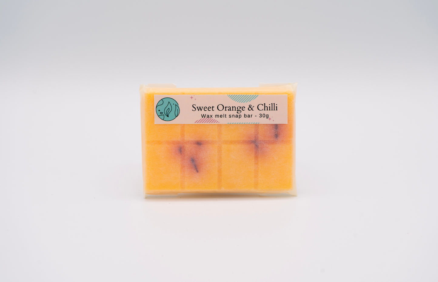sweet orange & chilli pepper scented 30g or 90g strongly scented wax melt snap bars. Eco friendly waxed paper packaging. Brighton Rock Workshop wax melts made in Spain and the United Kingdom, available in two sizes. Suitable for tea light or electric burners