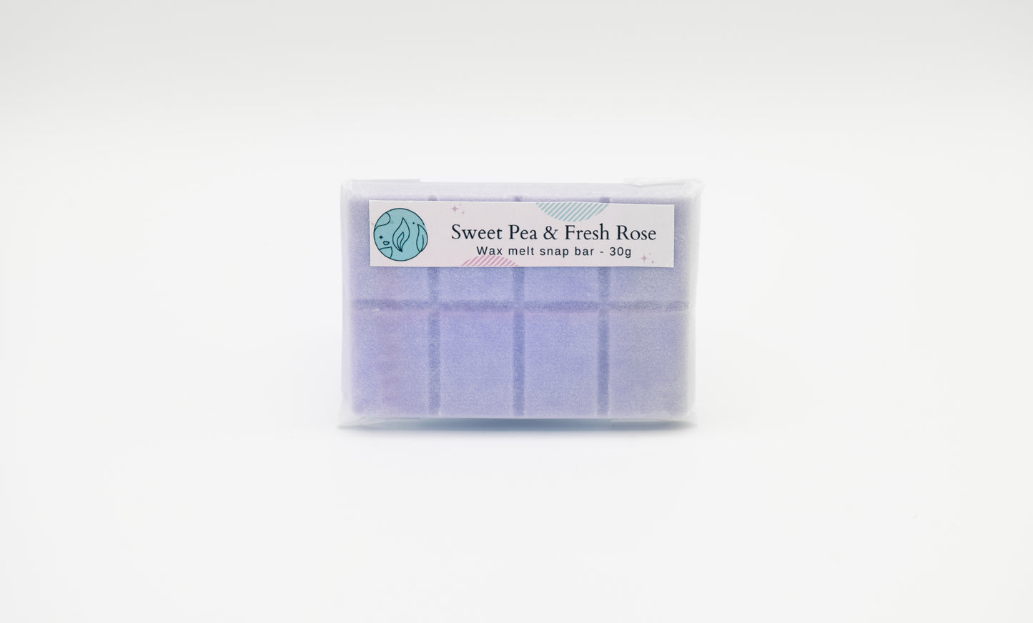 sweet pea and fresh rose scented purple 30g or 90g strongly scented wax melt snap bars. Eco friendly waxed paper packaging. Brighton Rock Workshop wax melts made in Spain and the United Kingdom, available in two sizes. Suitable for tea light or electric burners