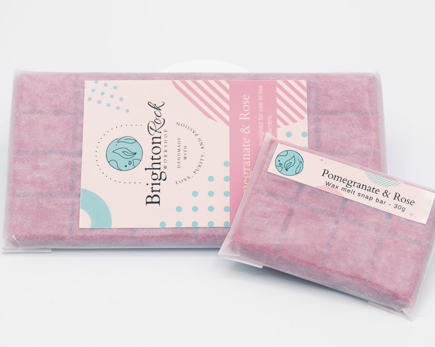 Pomegranate and rose scented 30g or 90g strongly scented wax melt snap bars. Eco friendly waxed paper packaging. Brighton Rock Workshop wax melts made in Spain and the United Kingdom, available in two sizes. Suitable for tea light or electric burners