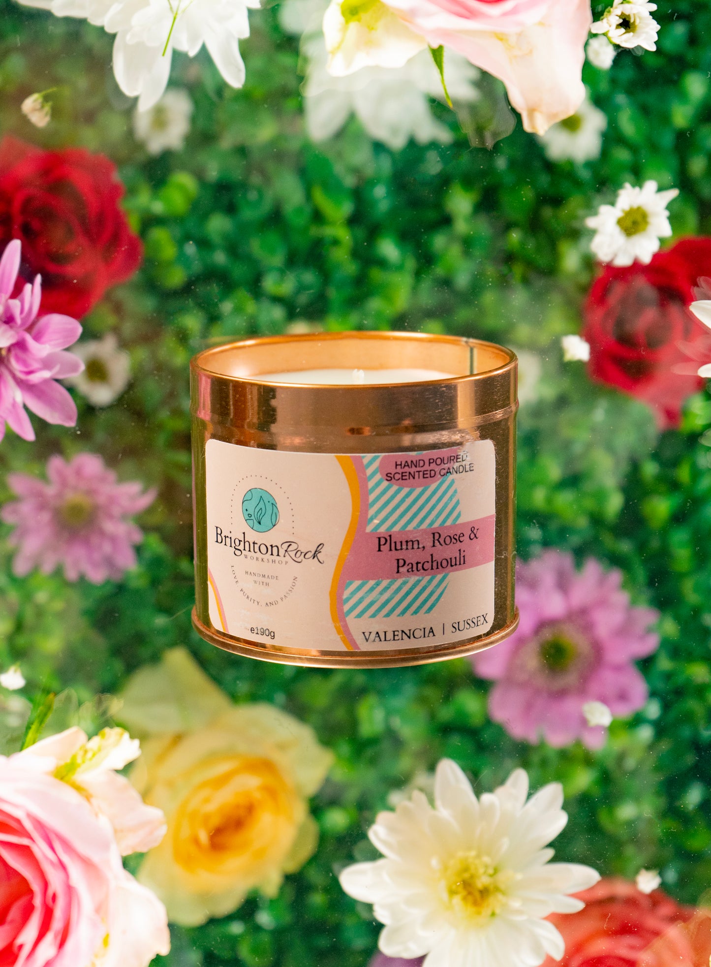 plum, rose & patchouli scented candle in a rose gold tin with matching lid. Brighton Rock Workshop strongly-scented candles. 190g eco-friendly, sustainable, recyclable packaging, vegan friendly and cruelty free