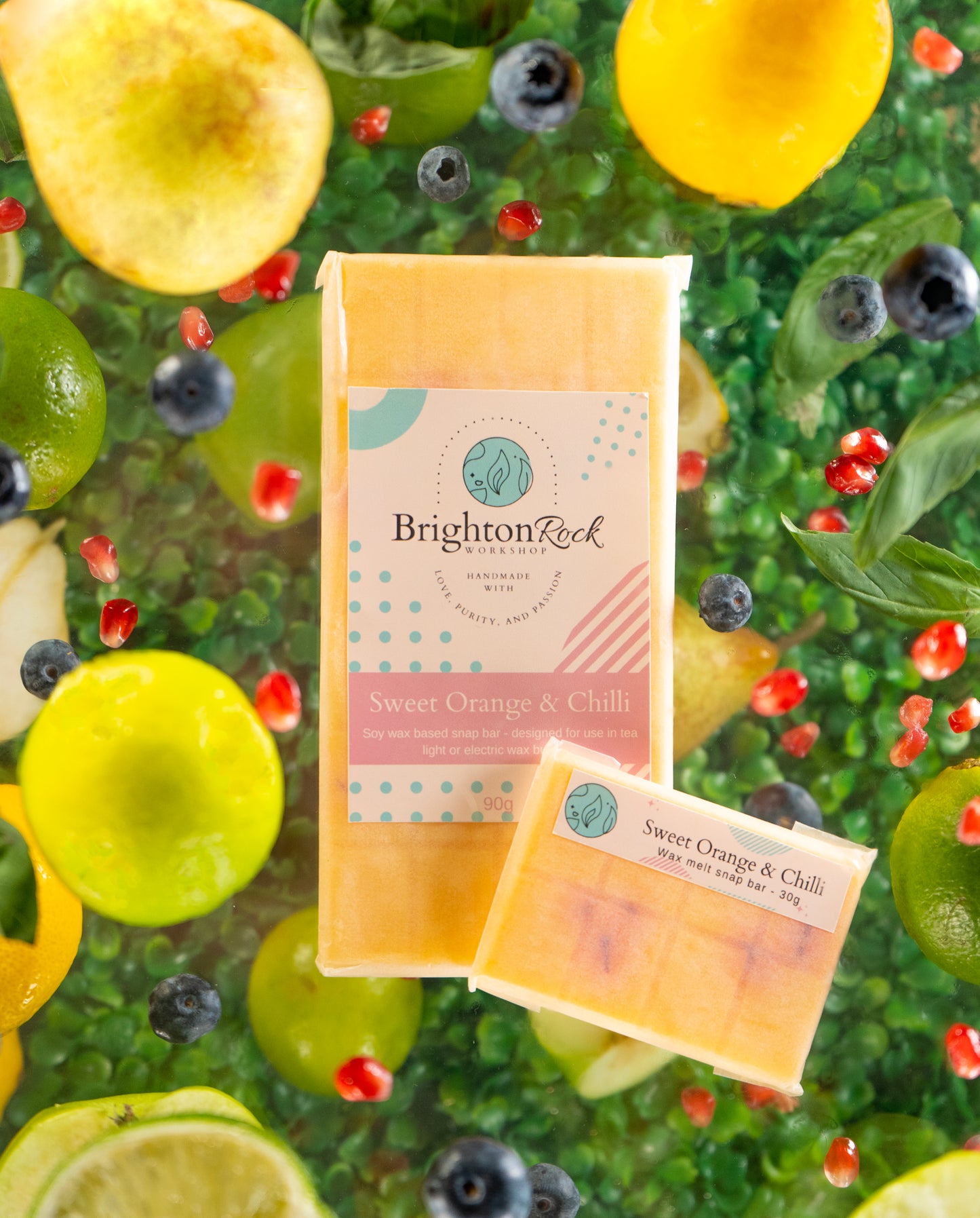 sweet orange & chilli pepper scented 30g or 90g strongly scented wax melt snap bars. Eco friendly waxed paper packaging. Brighton Rock Workshop wax melts made in Spain and the United Kingdom, available in two sizes. Suitable for tea light or electric burners