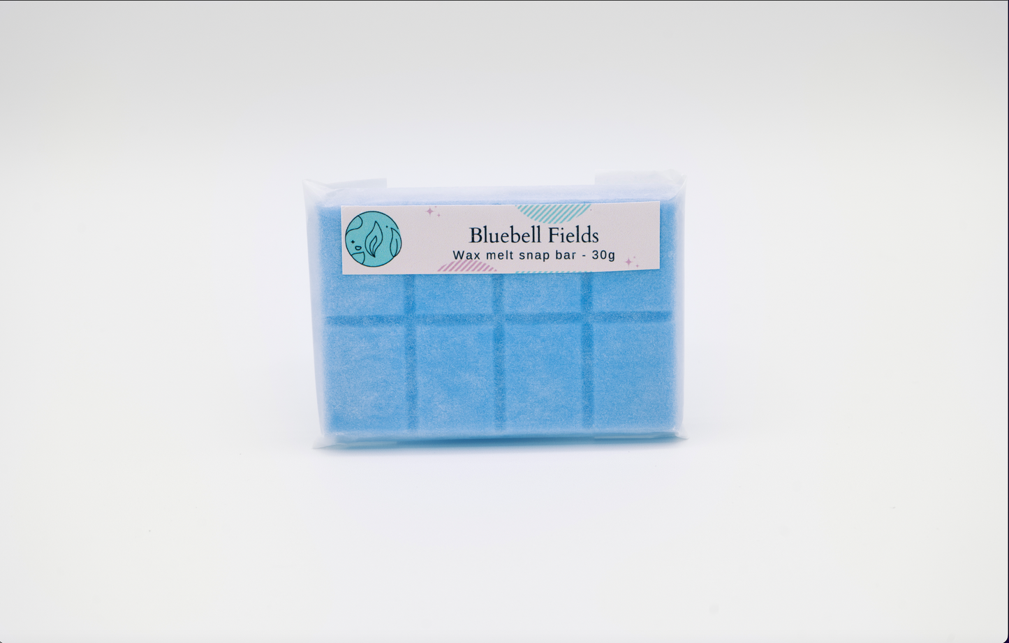 bluebell fields 30g or 90g strongly scented wax melt snap bars. Eco friendly waxed paper packaging. Brighton Rock Workshop wax melts made in Spain and the United Kingdom, available in two sizes. Suitable for tea light or electric burners