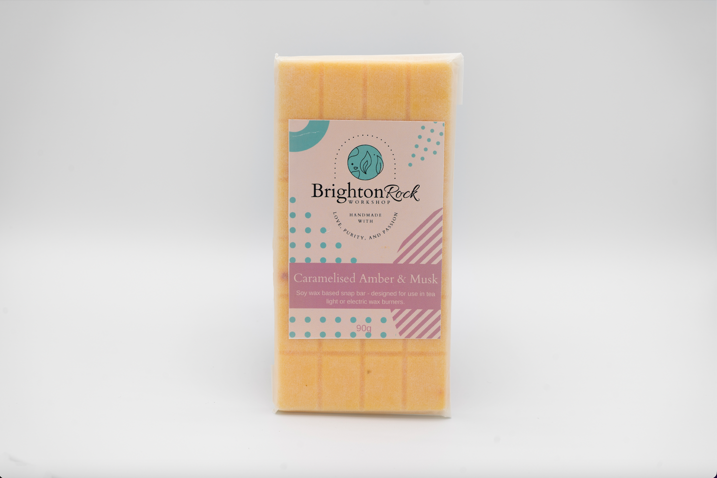 caramelised amber and musk 30g or 90g strongly scented wax melt snap bars. Eco friendly waxed paper packaging. Brighton Rock Workshop wax melts made in Spain and the United Kingdom, available in two sizes. Suitable for tea light or electric burners