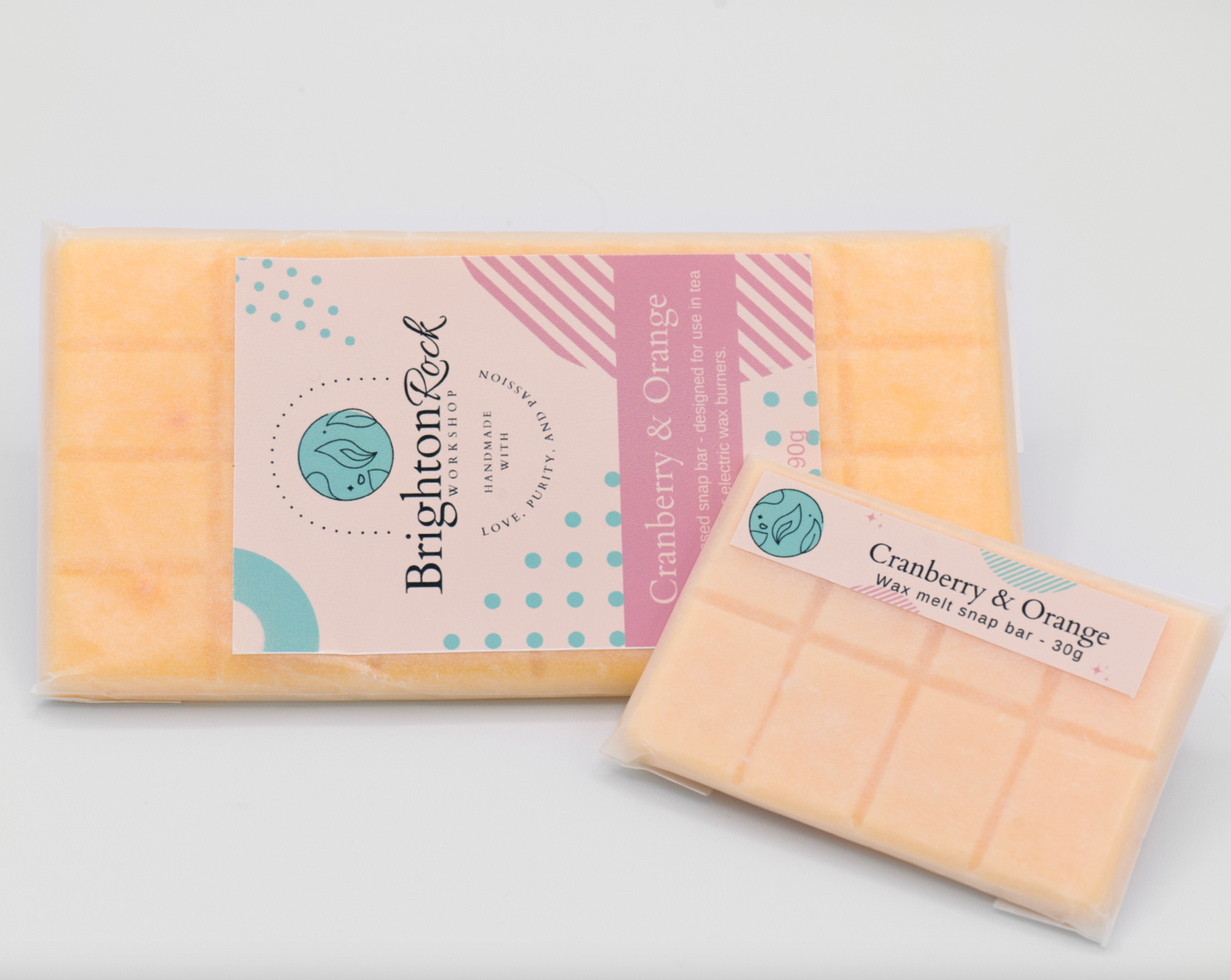 cranberry & orange 30g or 90g strongly scented wax melt snap bars. Eco friendly waxed paper packaging. Brighton Rock Workshop wax melts made in Spain and the United Kingdom, available in two sizes. Suitable for tea light or electric burners