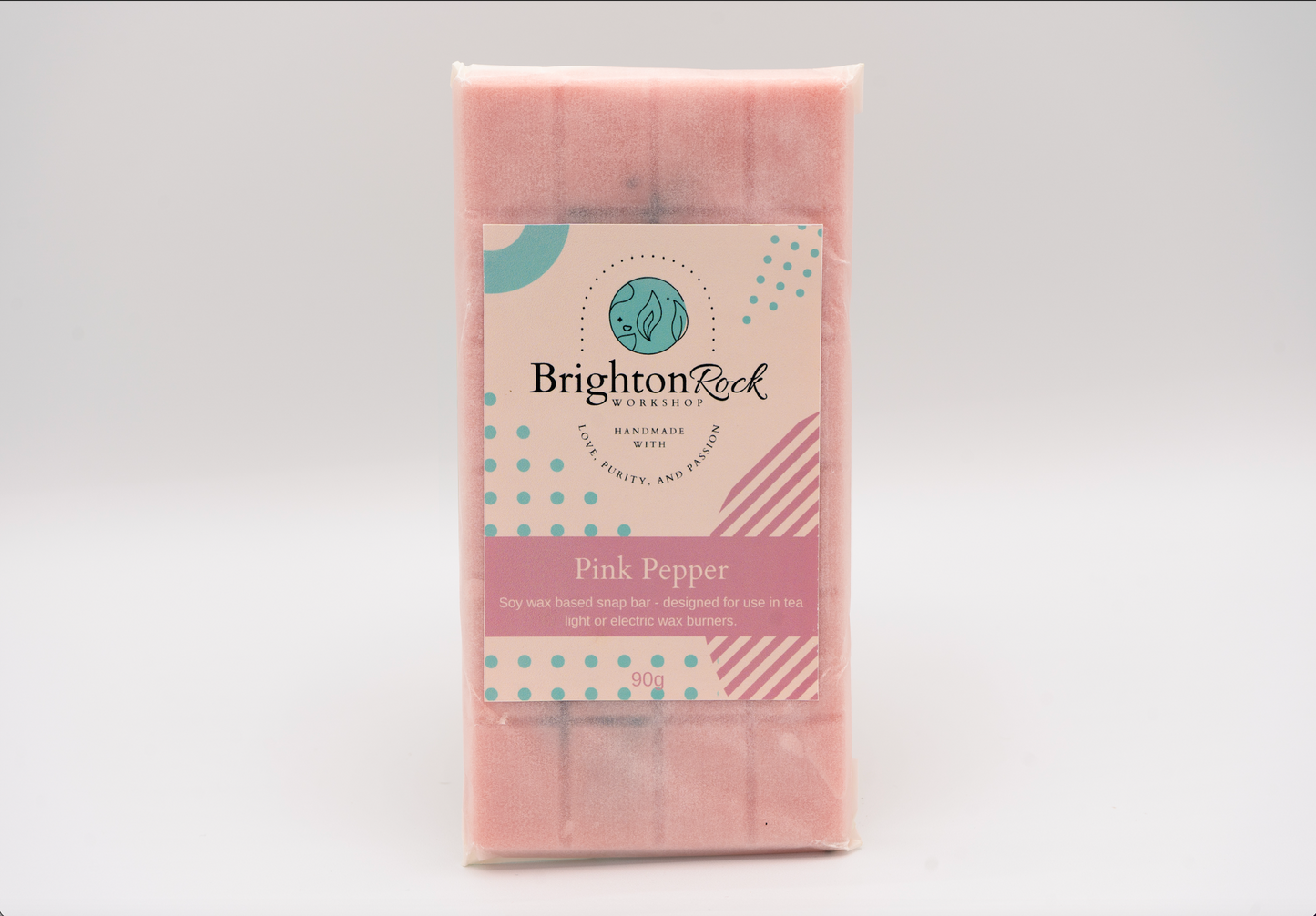 Pink pepper and rose petals scented 30g or 90g strongly scented wax melt snap bars. Eco friendly waxed paper packaging. Brighton Rock Workshop wax melts made in Spain and the United Kingdom, available in two sizes. Suitable for tea light or electric burners