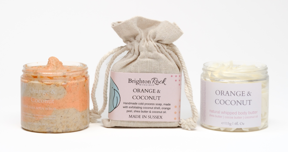 orange & coconut vegan and cruelty-free skincare set handmade in Brighton, UK. Foaming shea shower scrub, bar soap and natural whipped body butter. long lasting fragrance