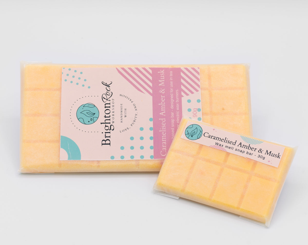 caramelised amber and musk 30g or 90g strongly scented wax melt snap bars. Eco friendly waxed paper packaging. Brighton Rock Workshop wax melts made in Spain and the United Kingdom, available in two sizes. Suitable for tea light or electric burners