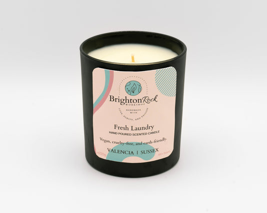 Fresh Laundry Brighton Rock Workshop independent brand scented candle in 220g black Italian glass jar. Strongly scented home fragrance, made in Alicante, Spain. Ships to Europe and the UK. Eco-friendly packaging, vegan & cruelty-free