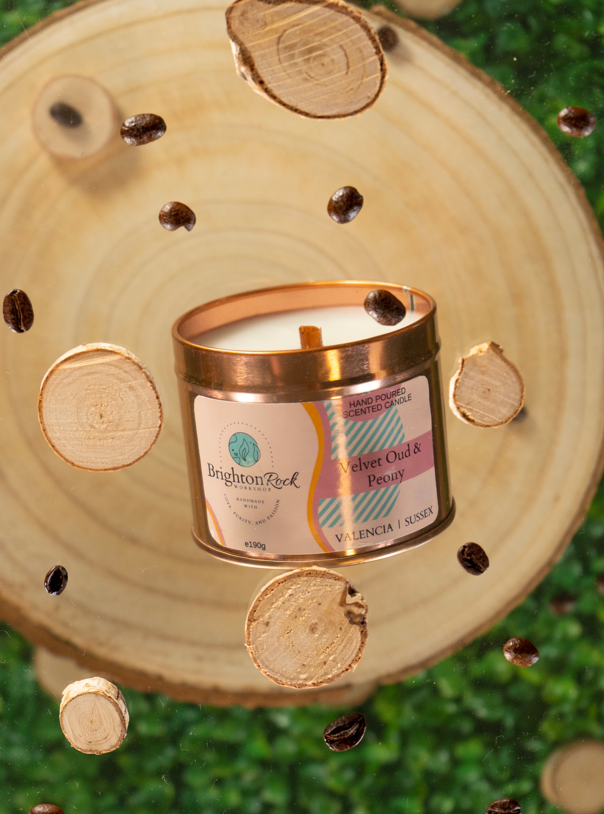 Velvet oud & peony scented candle in a rose gold tin with matching lid. Brighton Rock Workshop strongly-scented candles. 190g eco-friendly, sustainable, recyclable packaging, vegan friendly and cruelty free