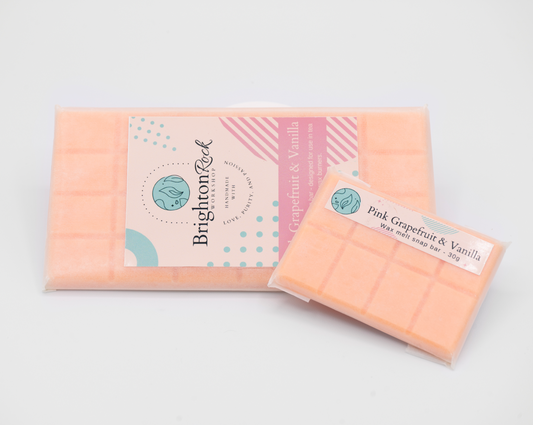 pink grapefruit and vanilla scented 30g or 90g strongly scented wax melt snap bars. Eco friendly waxed paper packaging. Brighton Rock Workshop wax melts made in Spain and the United Kingdom, available in two sizes. Suitable for tea light or electric burners