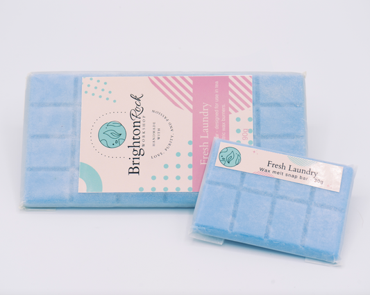 fresh laundry scented blue 30g or 90g strongly scented wax melt snap bars. Eco friendly waxed paper packaging. Brighton Rock Workshop wax melts made in Spain and the United Kingdom, available in two sizes. Suitable for tea light or electric burners