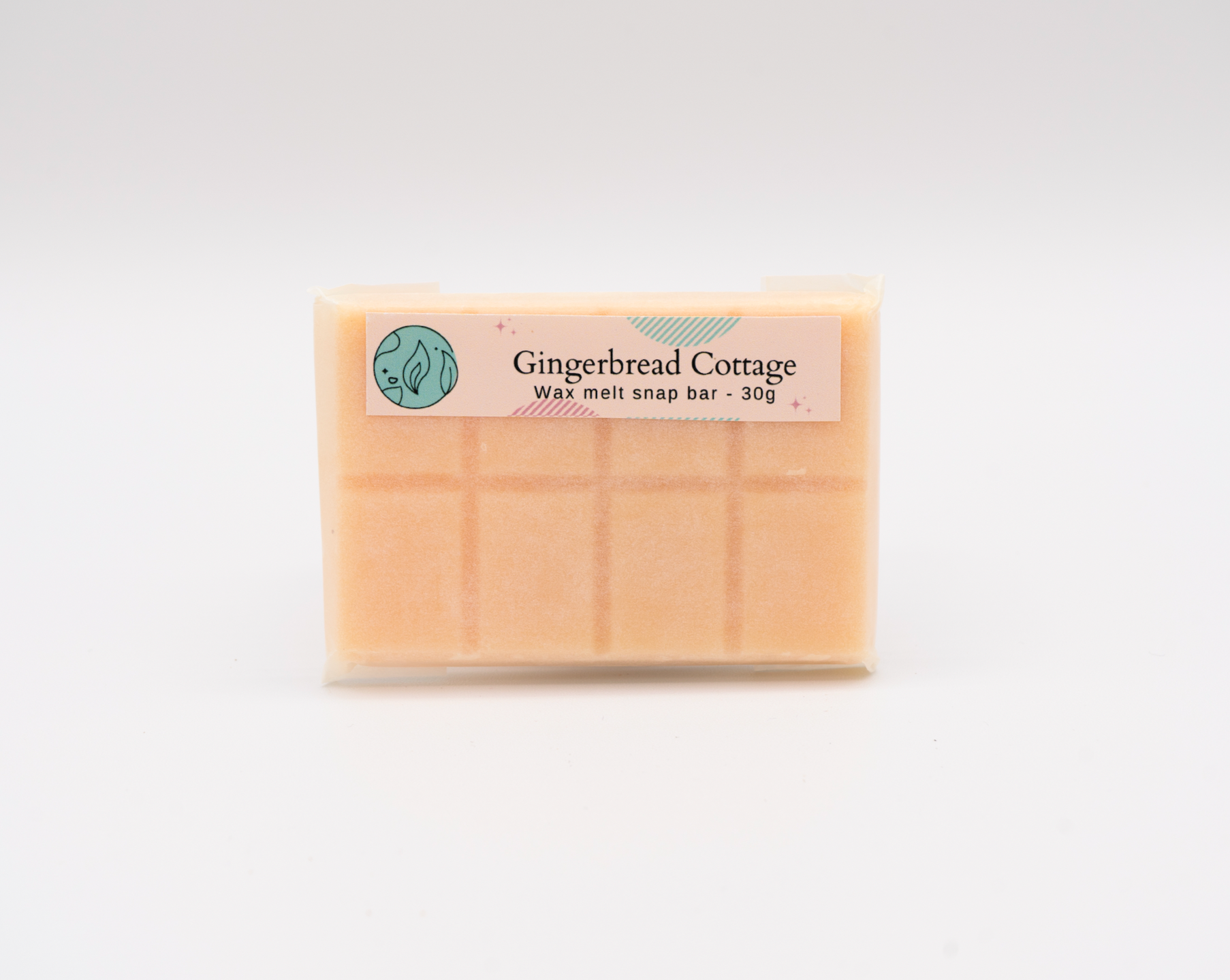 gingerbread cottage scented 30g or 90g strongly scented wax melt snap bars. Eco friendly waxed paper packaging. Brighton Rock Workshop wax melts made in Spain and the United Kingdom, available in two sizes. Suitable for tea light or electric burners