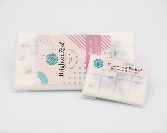 Plum, rose & patchouli scented 30g or 90g strongly scented wax melt snap bars. Eco friendly waxed paper packaging. Brighton Rock Workshop wax melts made in Spain and the United Kingdom, available in two sizes. Suitable for tea light or electric burners