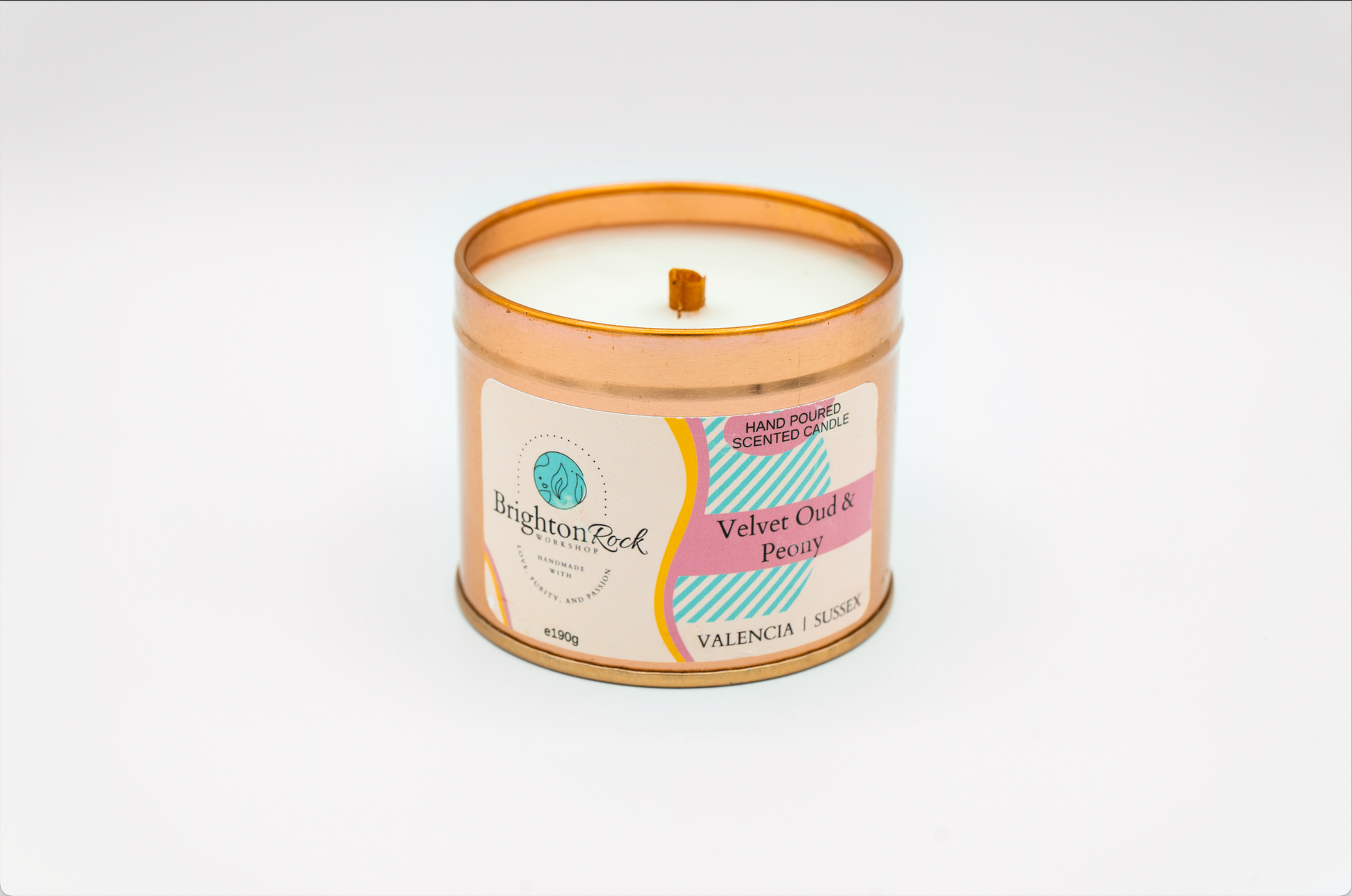 Velvet oud & peony scented candle in a rose gold tin with matching lid. Brighton Rock Workshop strongly-scented candles. 190g eco-friendly, sustainable, recyclable packaging, vegan friendly and cruelty free