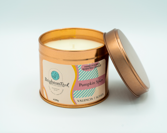 Pumpkin spice scented candle in a rose gold tin with matching lid. Brighton Rock Workshop strongly-scented candles. 190g eco-friendly, sustainable, recyclable packaging, vegan friendly and cruelty free