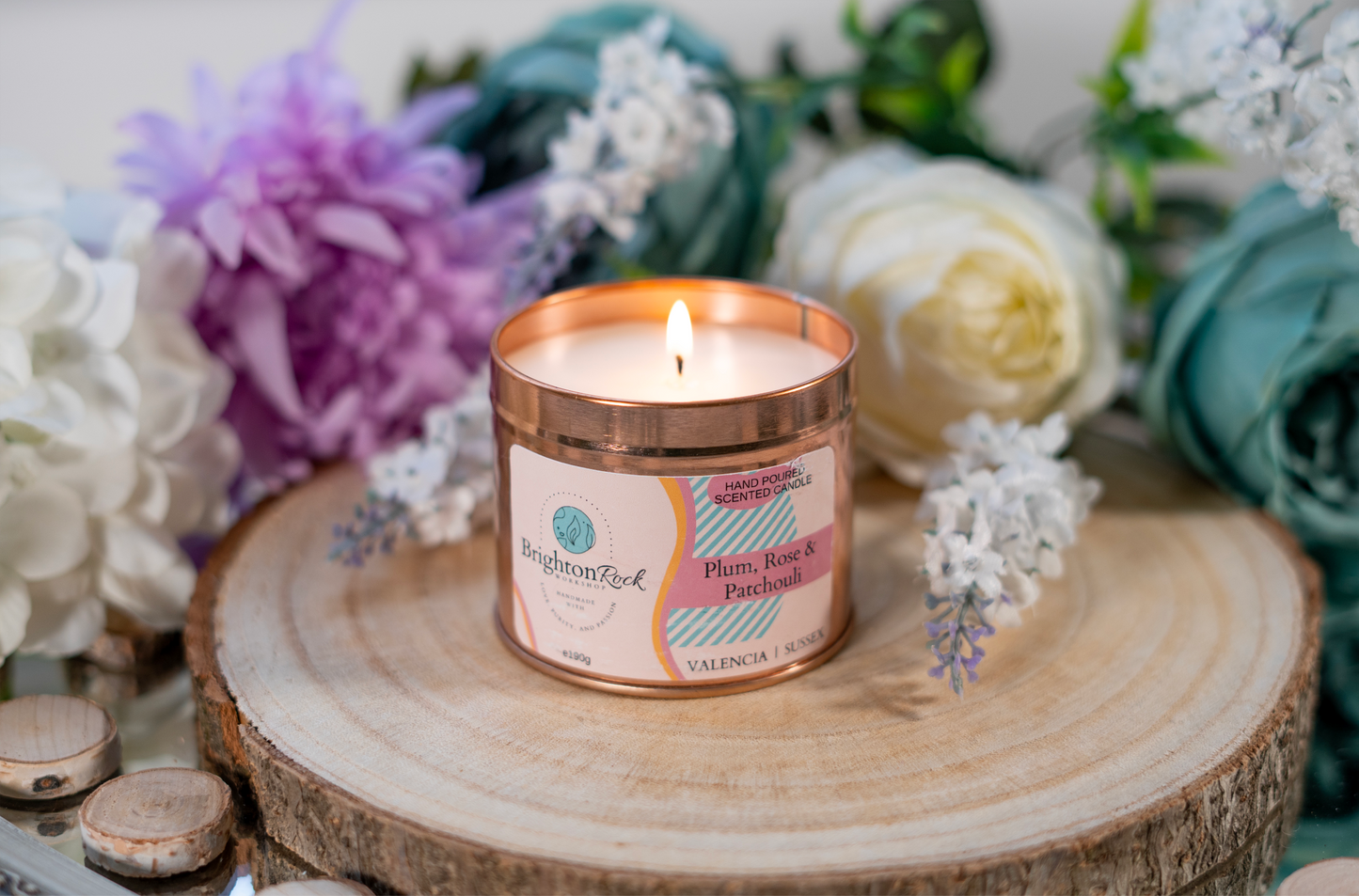 plum, rose & patchouli scented candle in a rose gold tin with matching lid. Brighton Rock Workshop strongly-scented candles. 190g eco-friendly, sustainable, recyclable packaging, vegan friendly and cruelty free