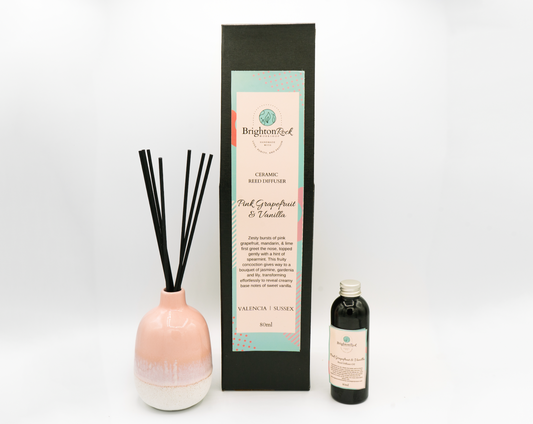 Brighton Rock Workshop pink grapefruit & vanilla reed diffuser in box. 80ml diffuser oil with set of fibre long lasting reeds and a hand glazed ceramic vase